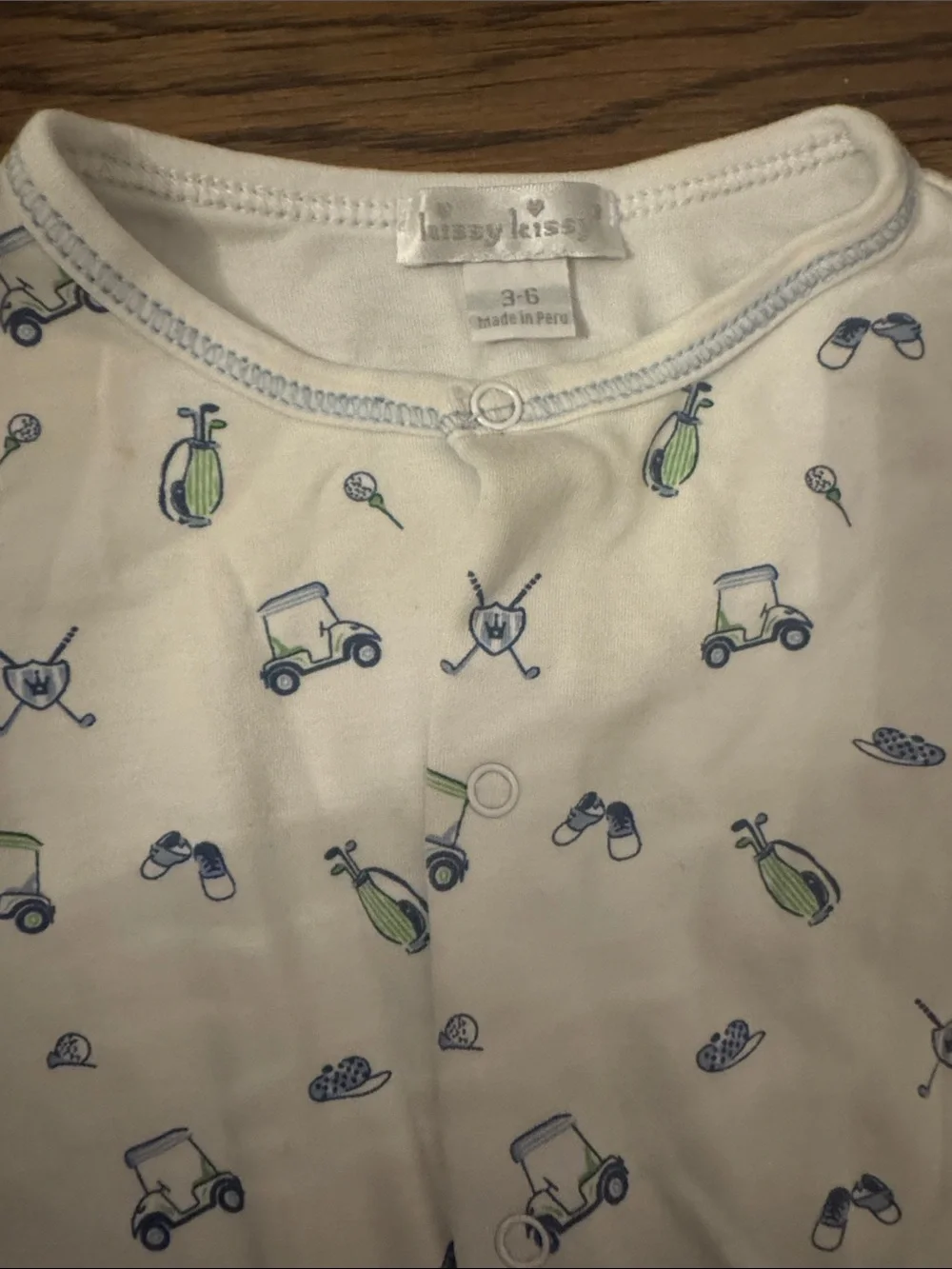 Kissy Kissy golf onesie